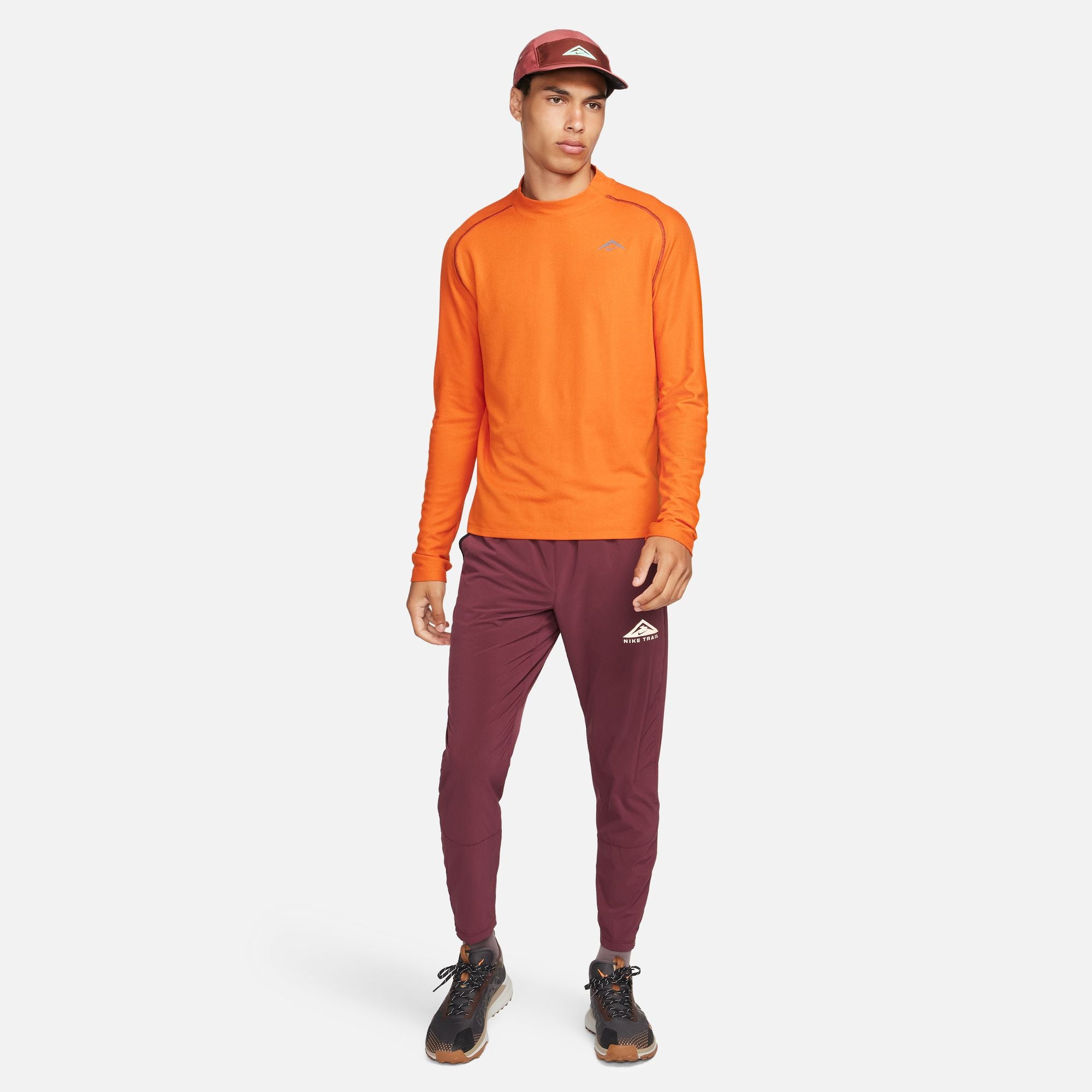 Black and best sale orange nike pants